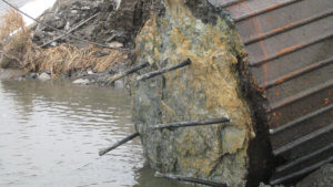 Herberger crews work on the demolition of an Ottumwa bridge.